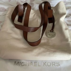 Michael Kors Winter White W/Brown leather handles shoulder bag